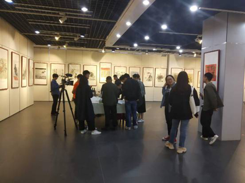 唐全明 郭建党书画展 在市图书...